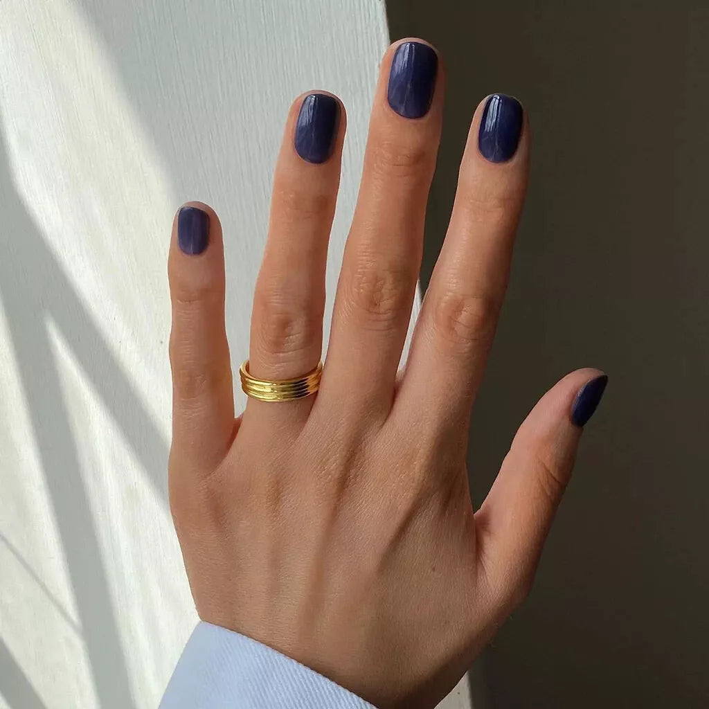 Bio Sculpture Gemini Nail Polish No. 2012 Midnight Blue 14ml – deep, elegant blue vegan nail polish. Rich, long-lasting midnight blue shade for sophisticated manicures