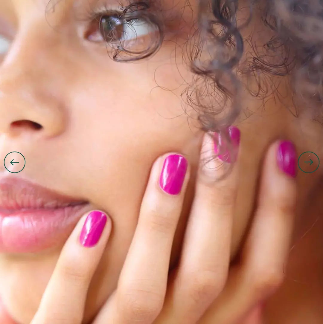 Hand with darker skin tone wearing Manucurist Armeria – gentle, vegan pink polish for inclusive, sophisticated manicures