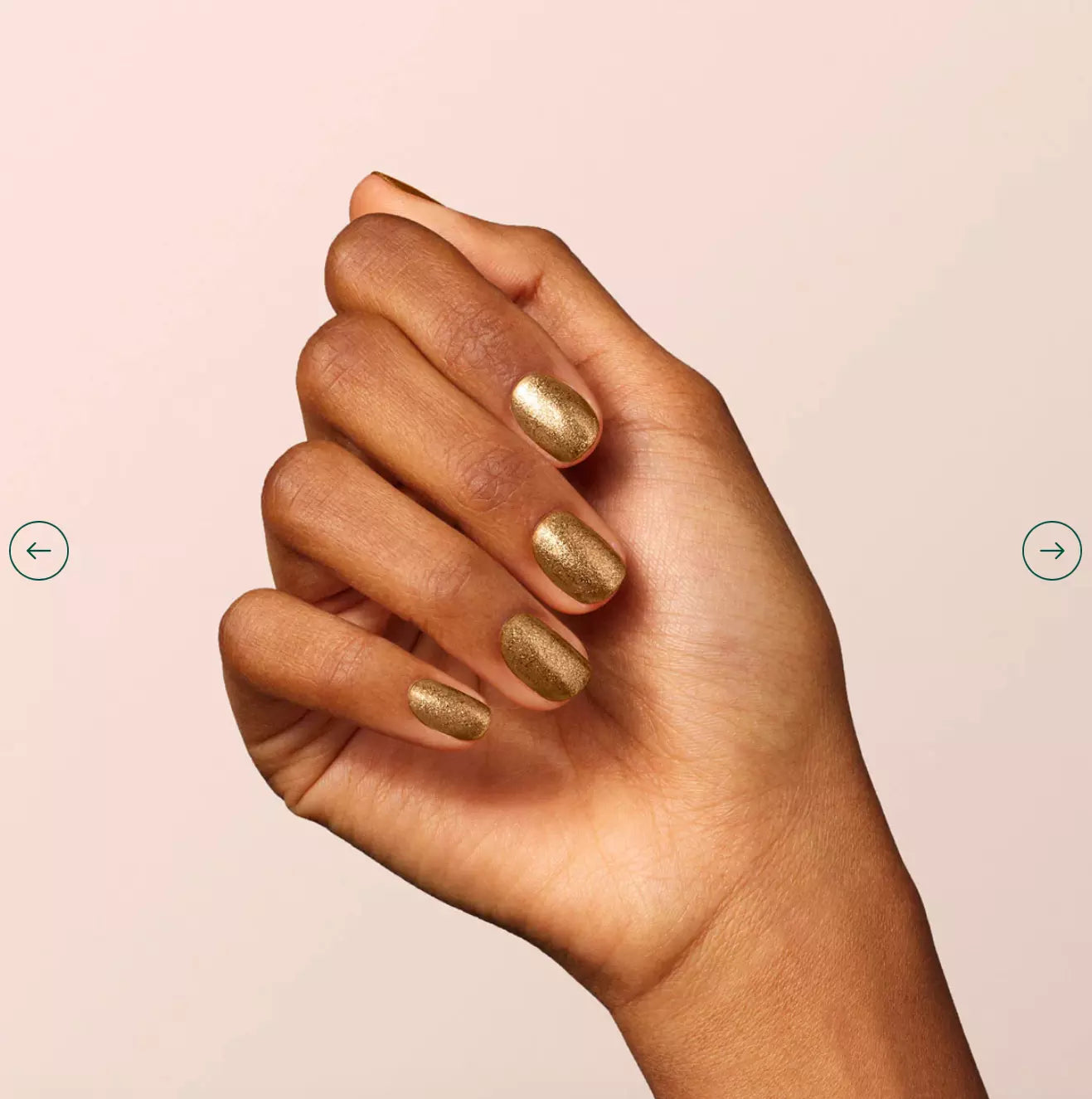 Hand with dark skin tone wearing Manucurist Bronzé – bold, vegan bronze polish for inclusive, striking manicures