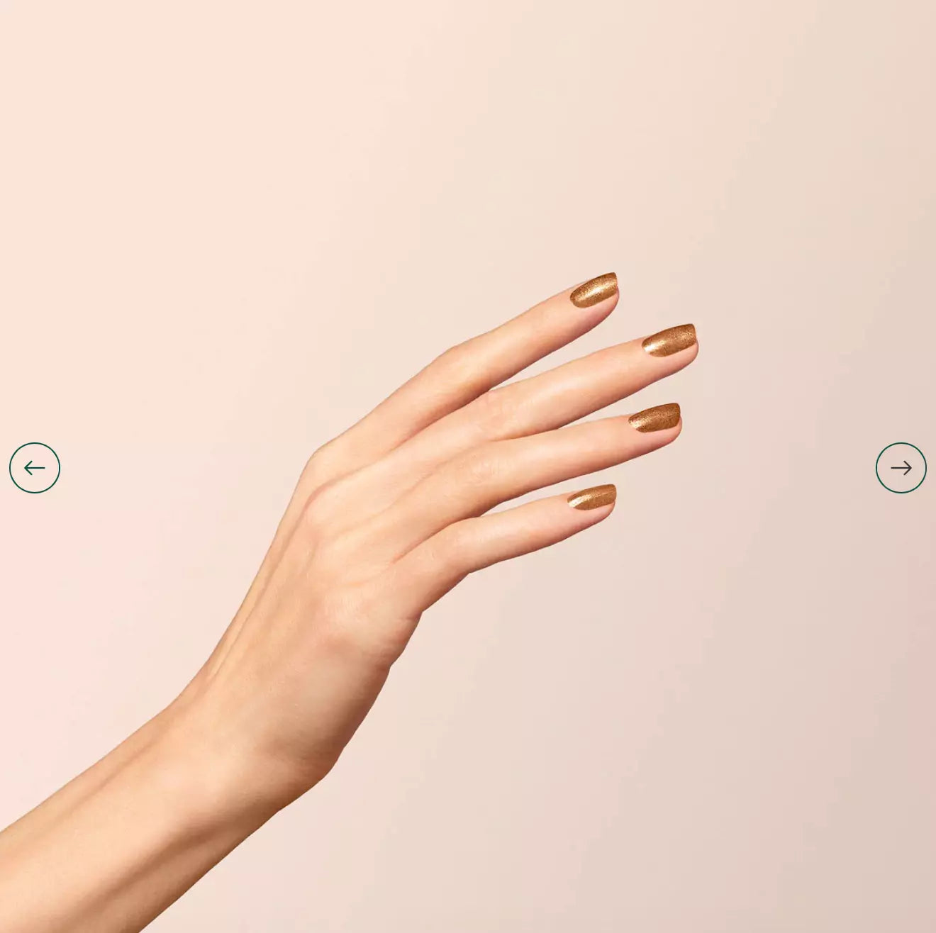 Nails featuring Manucurist Bronzé on light skin – cruelty-free, bronze polish for a sophisticated, standout finis