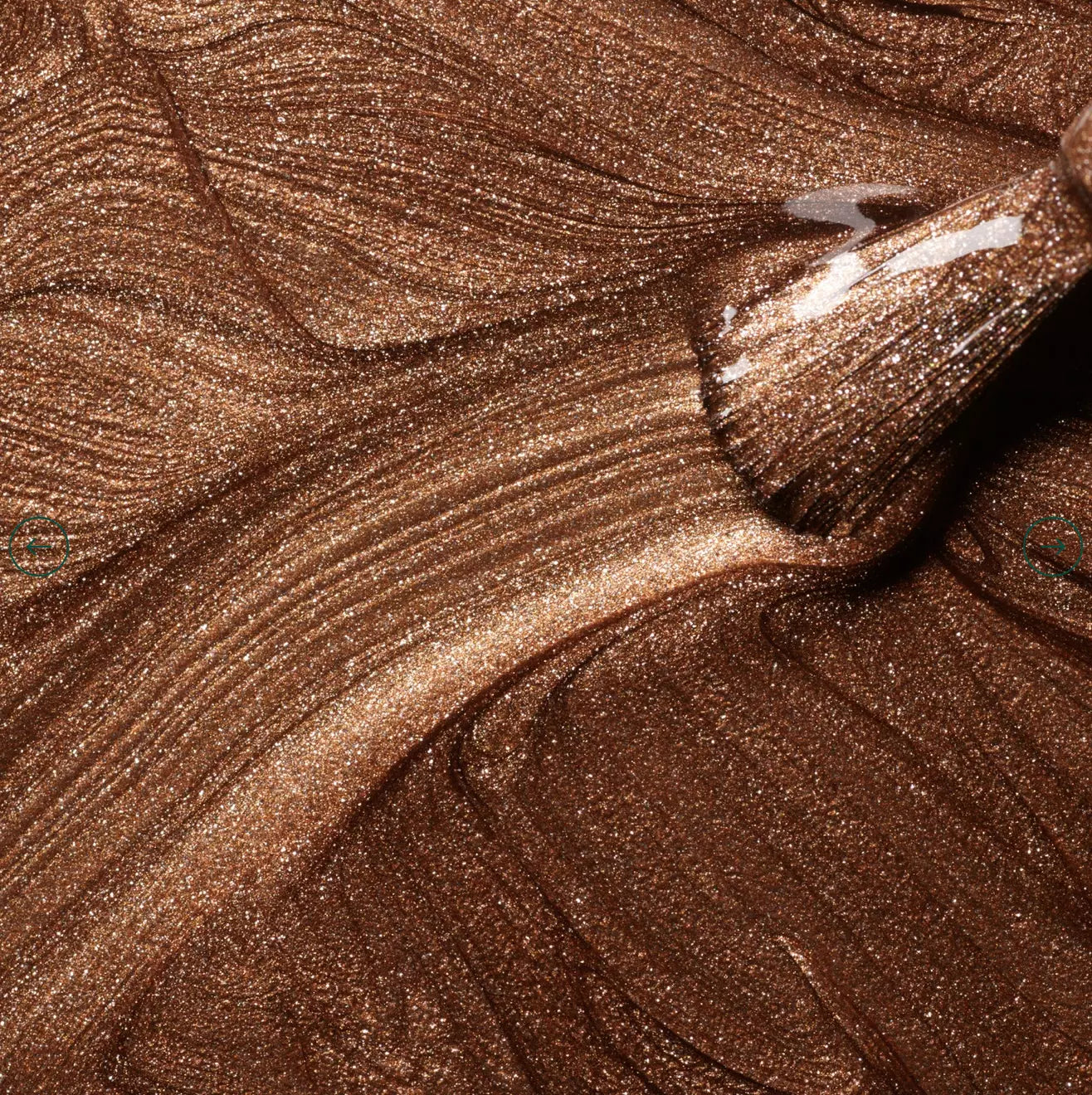 Polish brush dipped in Manucurist Bronzé nail polish – smooth, non-toxic bronze formula for flawless applicatio