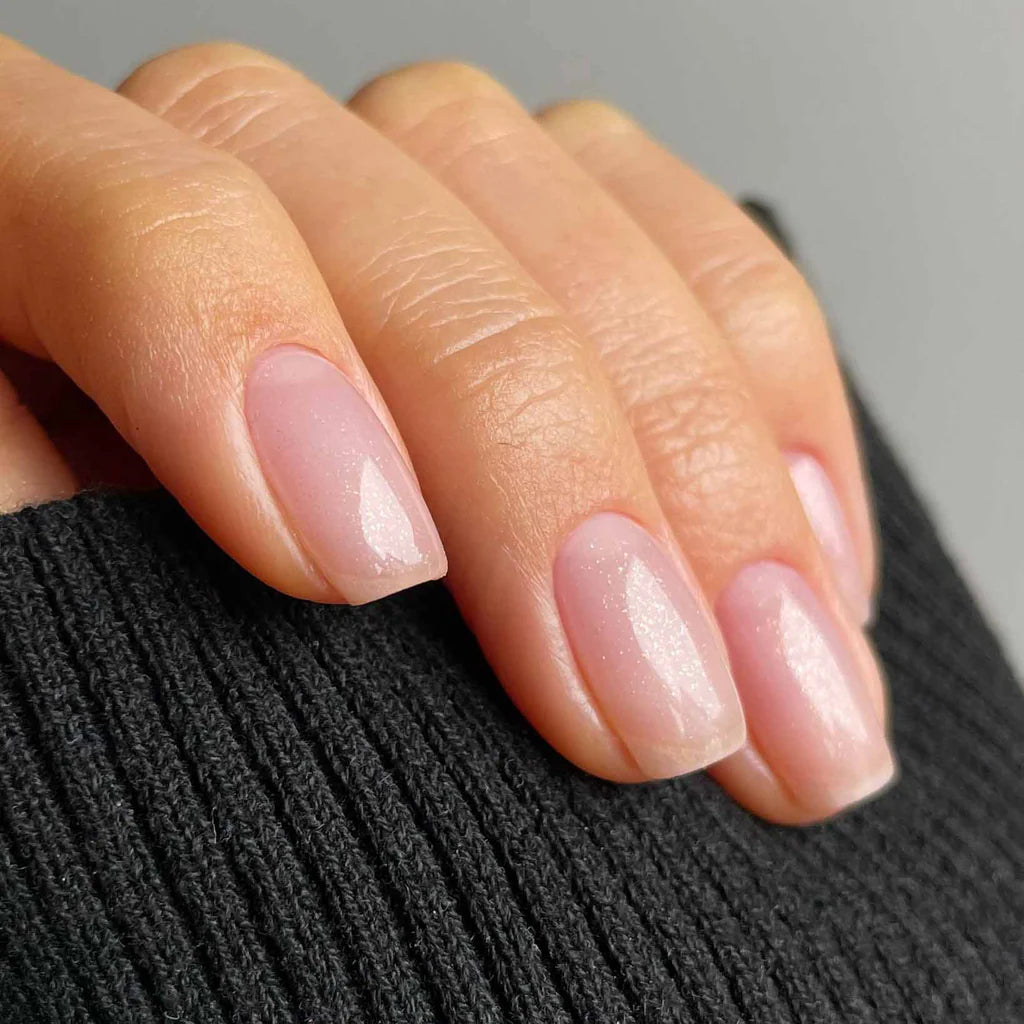 Nails featuring Bio Sculpture Baby Heart Confetti on light skin – cruelty-free, confetti polish for a fun, standout finish