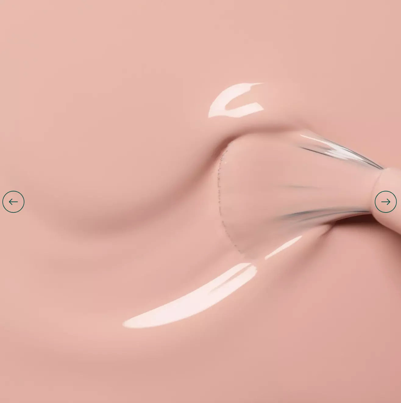 Polish brush dipped in Manucurist Dune nail polish – smooth, non-toxic sandy beige formula for flawless application
