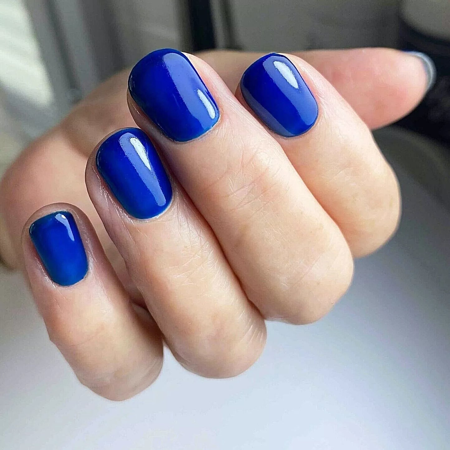 Nails featuring Bio Sculpture Gemini Nail Polish No. 131 Duke on light skin – cruelty-free, elegant navy blue polish for a timeless, eye-catching finish