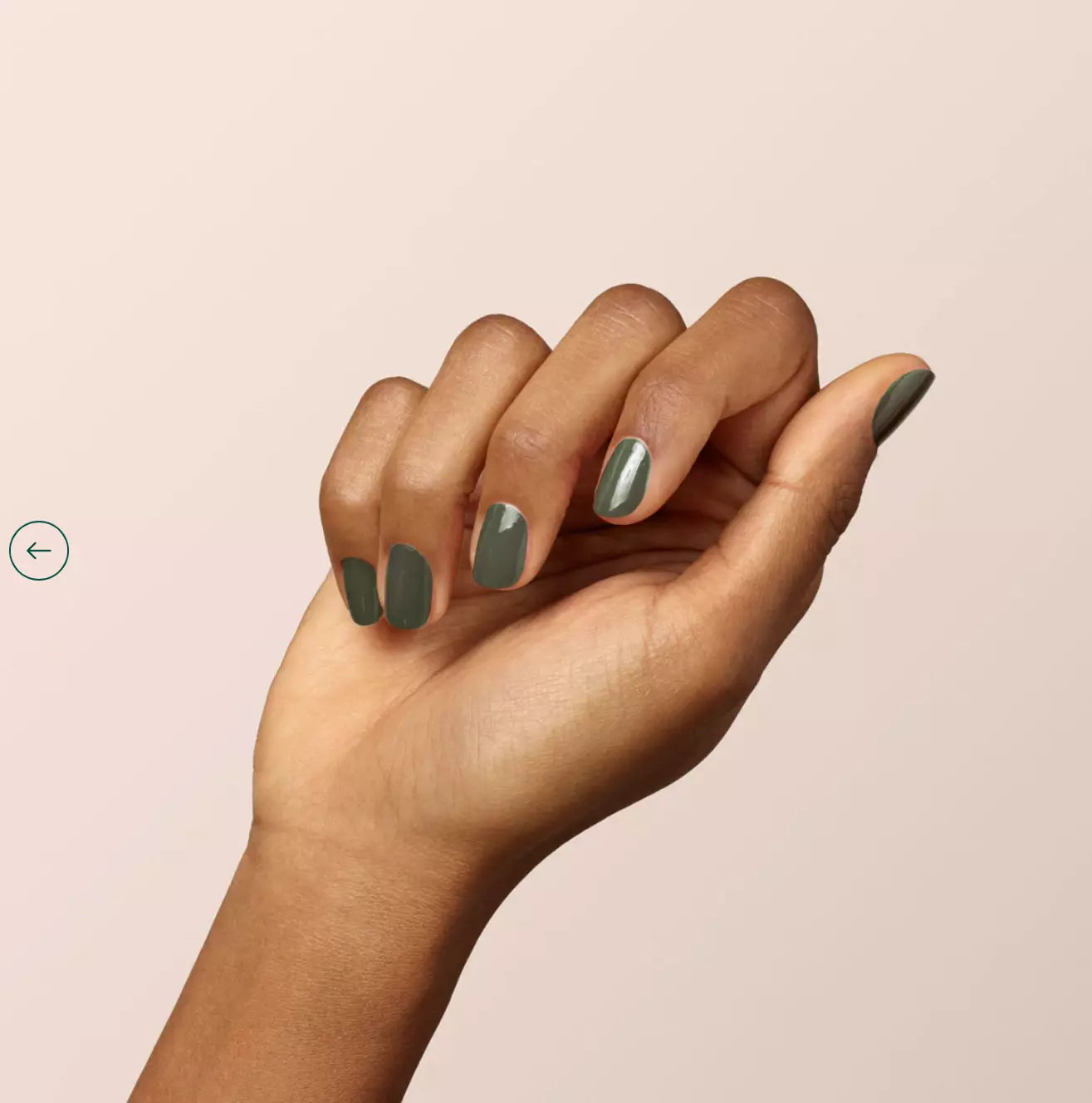Close-up of Khaki polish on dark skin – eco-friendly, muted green shade for striking nails