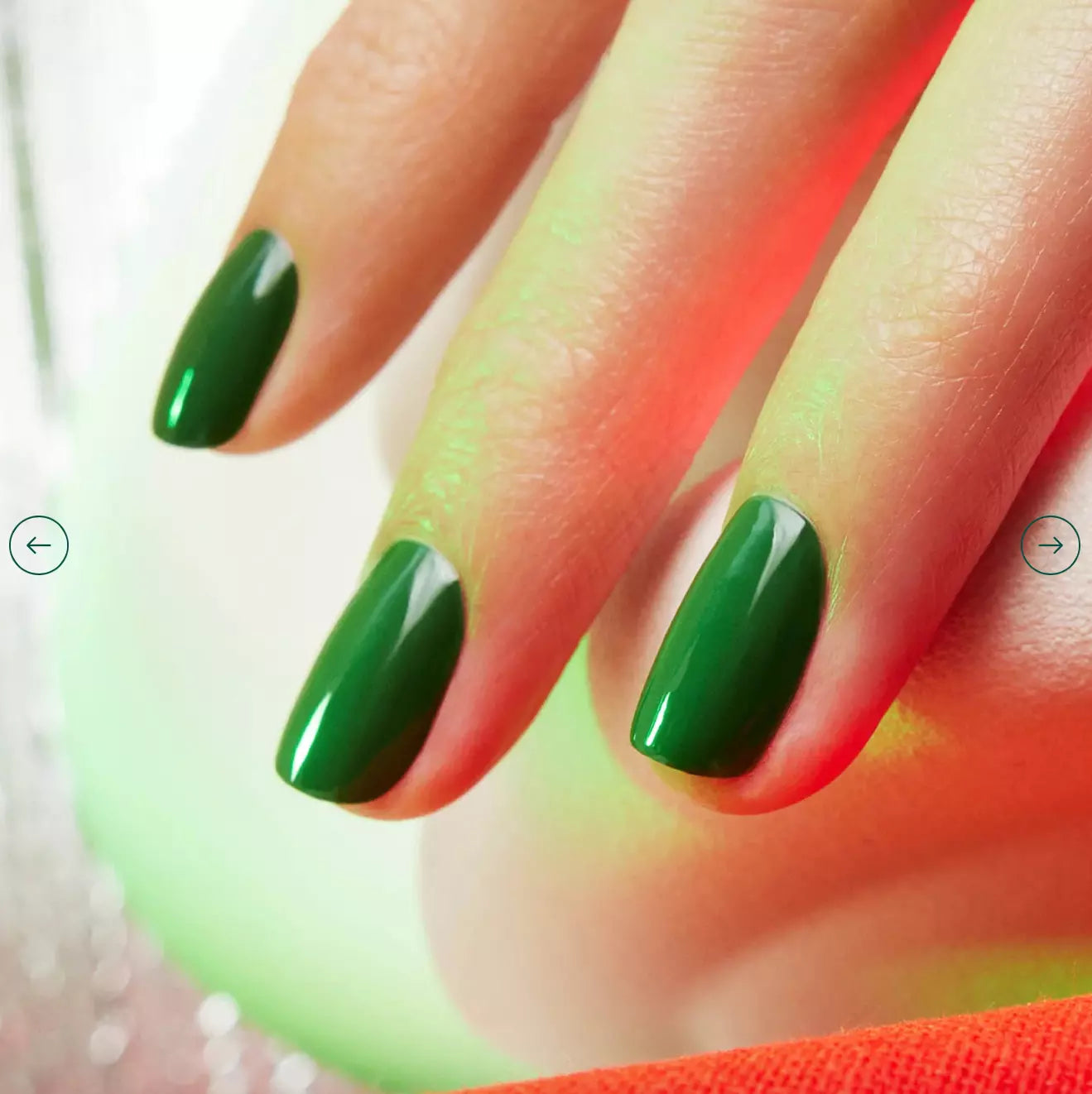 Hand with light skin tone wearing Manucurist Jade – soft, vegan jade green polish for a bright, elegant manicure