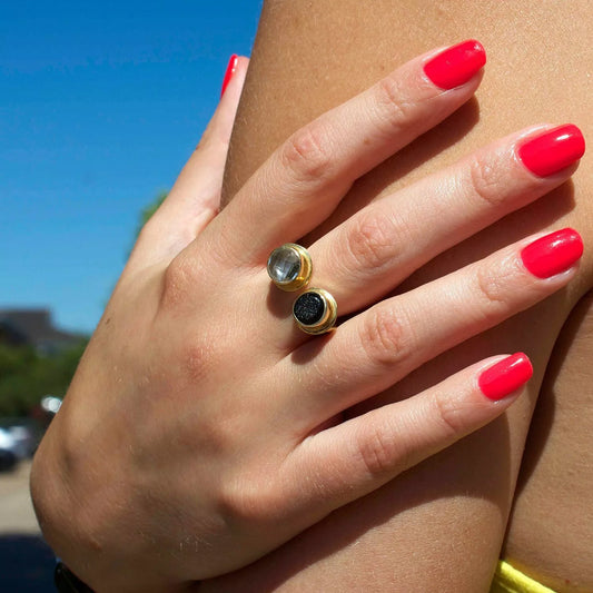 Hand wearing Bio Sculpture Gemini Nail Polish No. 172 Favela Sunrise – vegan, solid bright watermelon polish for a vibrant, trendy summer nail look