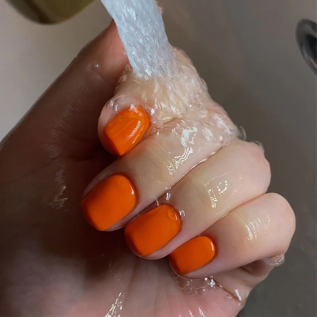 Bio Sculpture Gemini Nail Polish No. 2028 Tangerine 14ml. Close-up – non-toxic, bold orange shade for a fresh, modern nail look