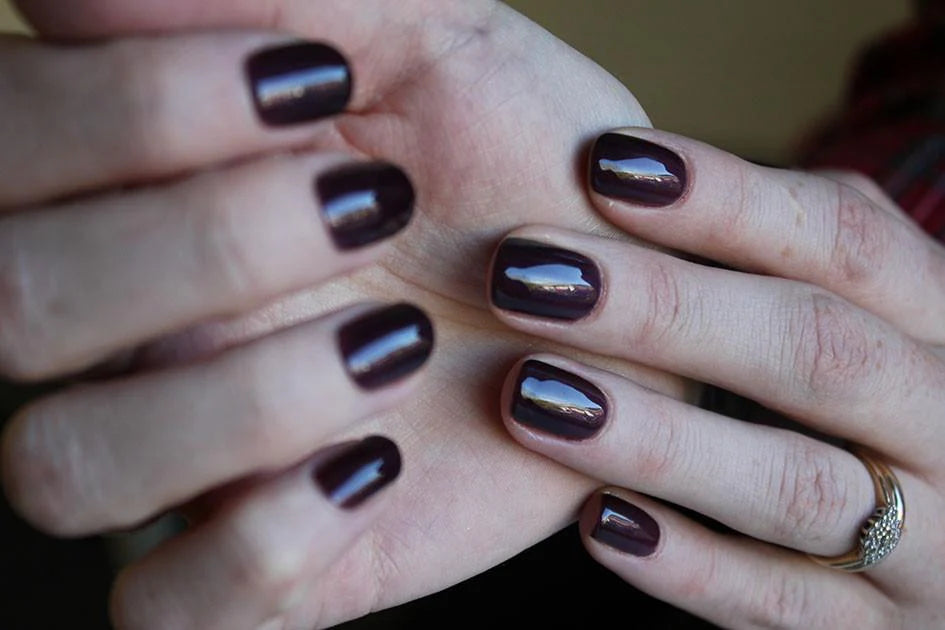 Nails featuring Bio Sculpture Gemini Nail Polish No. 2031 Black Aubergine on light skin – cruelty-free, bold black aubergine polish for a sophisticated, statement finish
