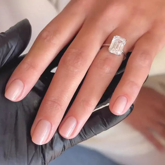 Hand with light skin tone wearing Bio Sculpture Gemini Nail Polish No. 2065 Sweet Candy Breath – vegan, pastel candy pink polish for a chic, feminine manicure