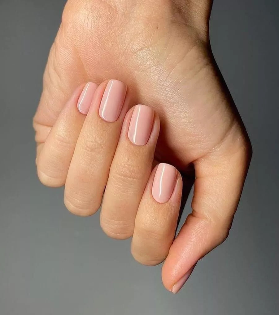 Nails featuring Bio Sculpture Gemini Nail Polish No. 2065 Sweet Candy Breath on light skin – cruelty-free, pastel pink polish for a sophisticated, elegant finish