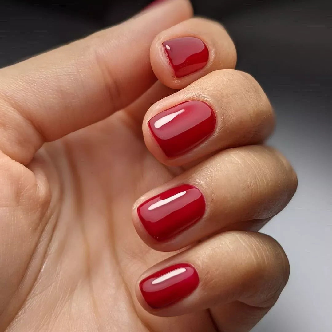 Nails featuring Bio Sculpture A Night at the Oper Nail Polish No. 280 on light skin – cruelty-free, deep burgundy polish for a refined, elegant finish