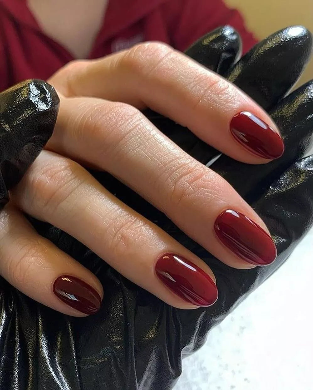 Close-up of A Night at the Opera Nail Polish No. 280 – eco-friendly, deep burgundy shade for radiant, sophisticated nails