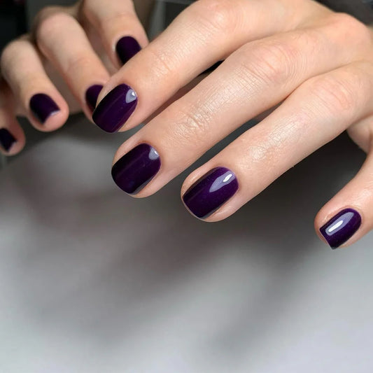 Fingers painted with Bio Sculpture Gemini Nail Polish Shade Amethyst Moonstone No.139 on light skin. Non-toxic, eco-friendly, breathable, cruelty-free, amethyst polish with subtle shimmer for a chic, versatile look