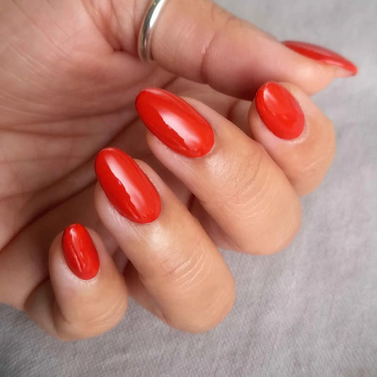 Close-up of Bio Sculpture Gemini Nail Polish No. 4, Rustic Terracotta polish on light skin – non-toxic, earthy terracotta shade for a stylish, contemporary nail look