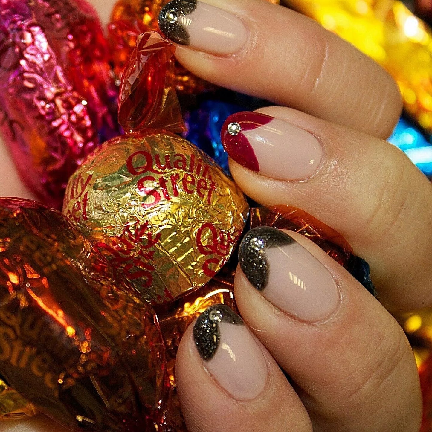 Nails featuring Bio Sculpture Gemini Nail Polish No. 63 Moulin Rouge on light skin – cruelty-free, glamorous red polish for a timeless, eye-catching finish