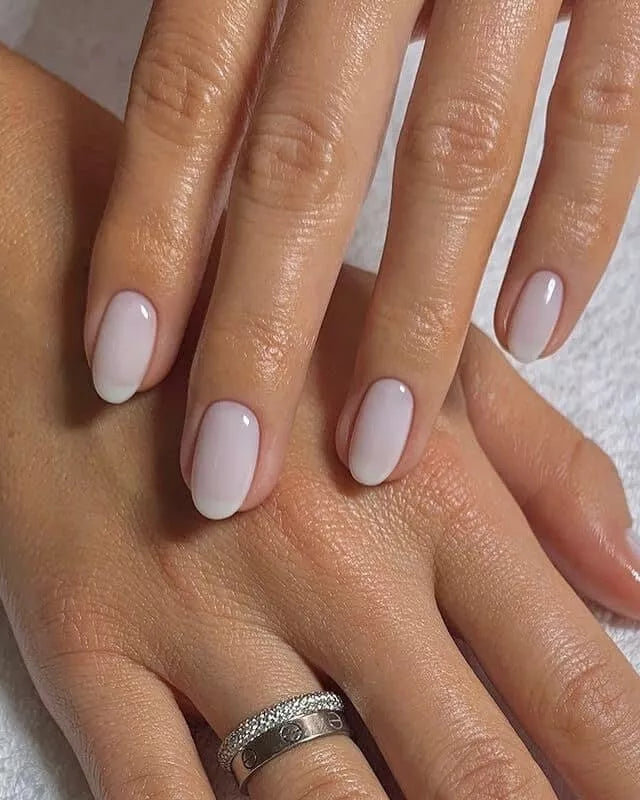 Nails featuring Bio Sculpture Gemini Nail Polish No. 66 French Blanc on light skin – cruelty-free, bright white polish for a fresh, elegant finish