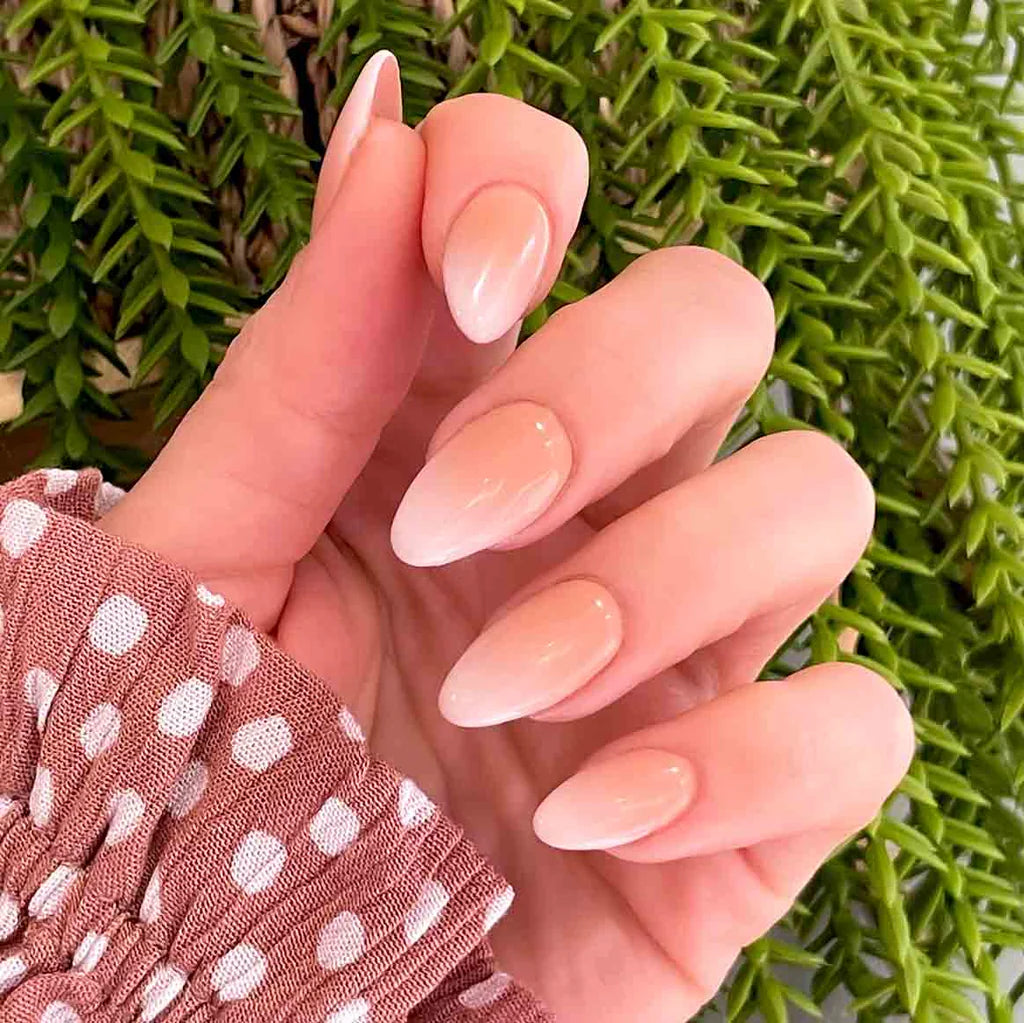 Close-up of Bio Sculpture Gemini Nail Polish No. 2095 Nude Beige polish on light skin – non-toxic, classic nude shade for a refined, everyday nail look