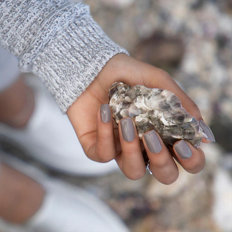 Bio Sculpture Gemini Nail Polish No. 294 Oyster Shell 14ml. Close-up of Oyster Shell polish on light skin – non-toxic, soft neutral shade for an understated nail look