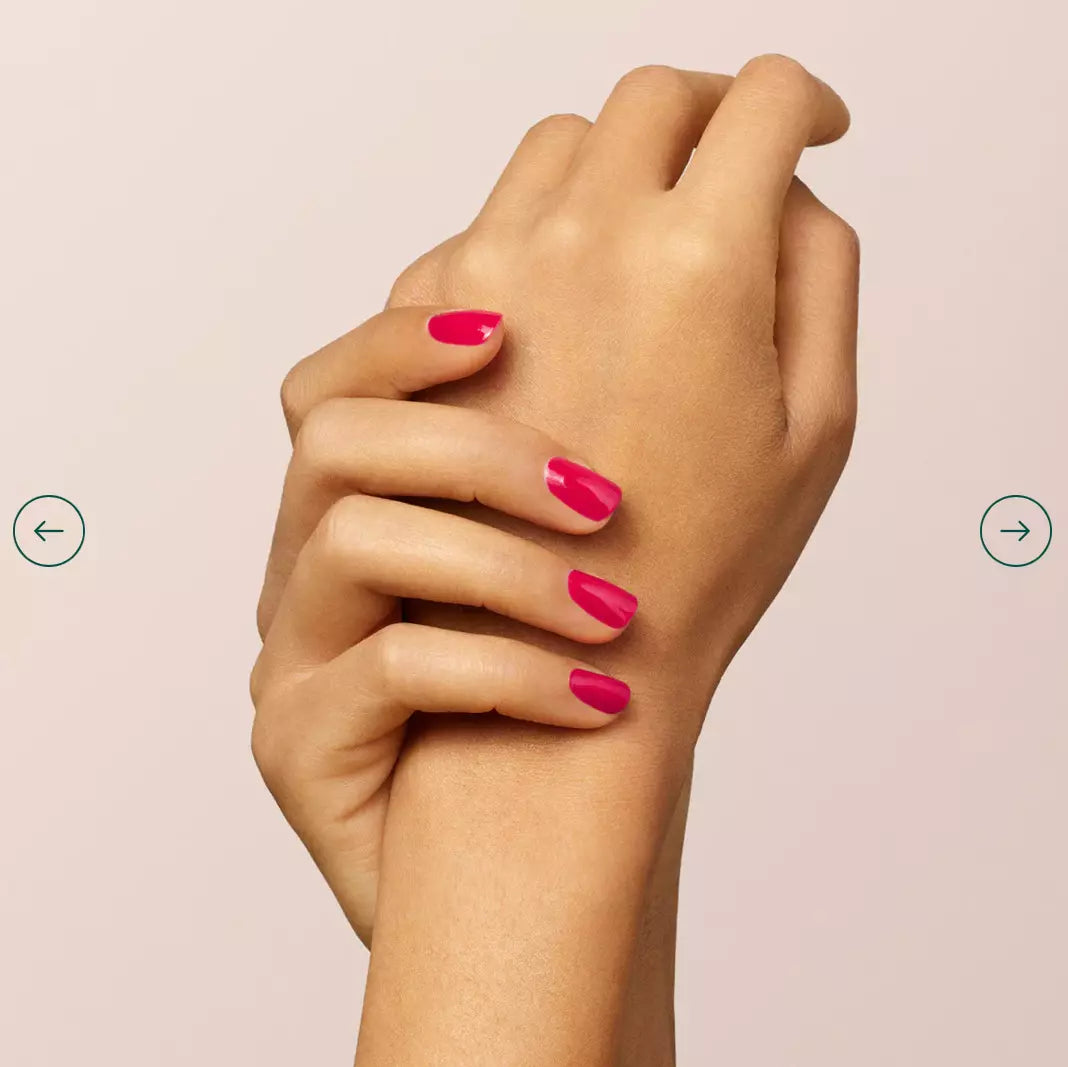 Fingers featuring Manucurist Green Range Peonie nail polish – non-toxic, long-lasting pink for everyday elegance