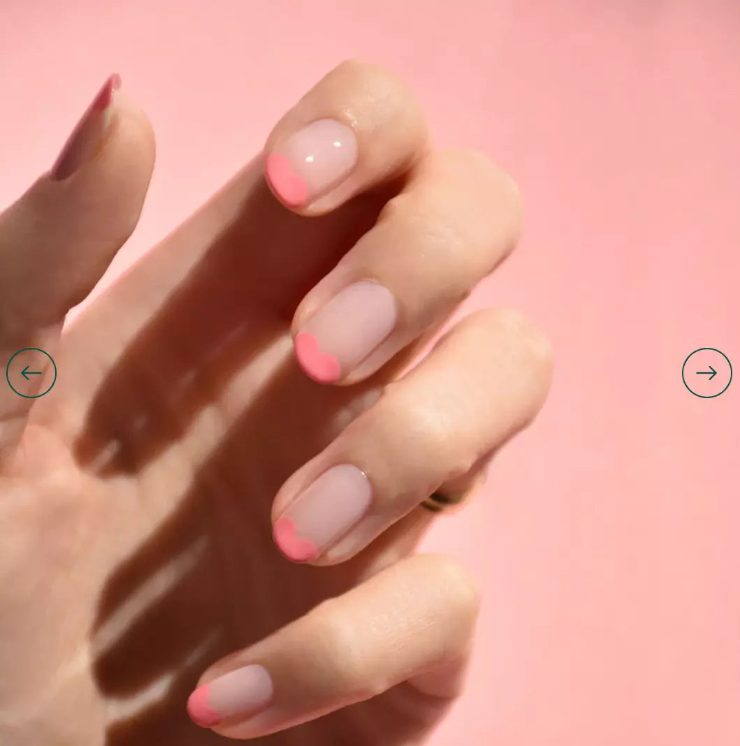 Fingers painted with Pink Paradise by Manucurist – non-toxic, bright pink polish for everyday style