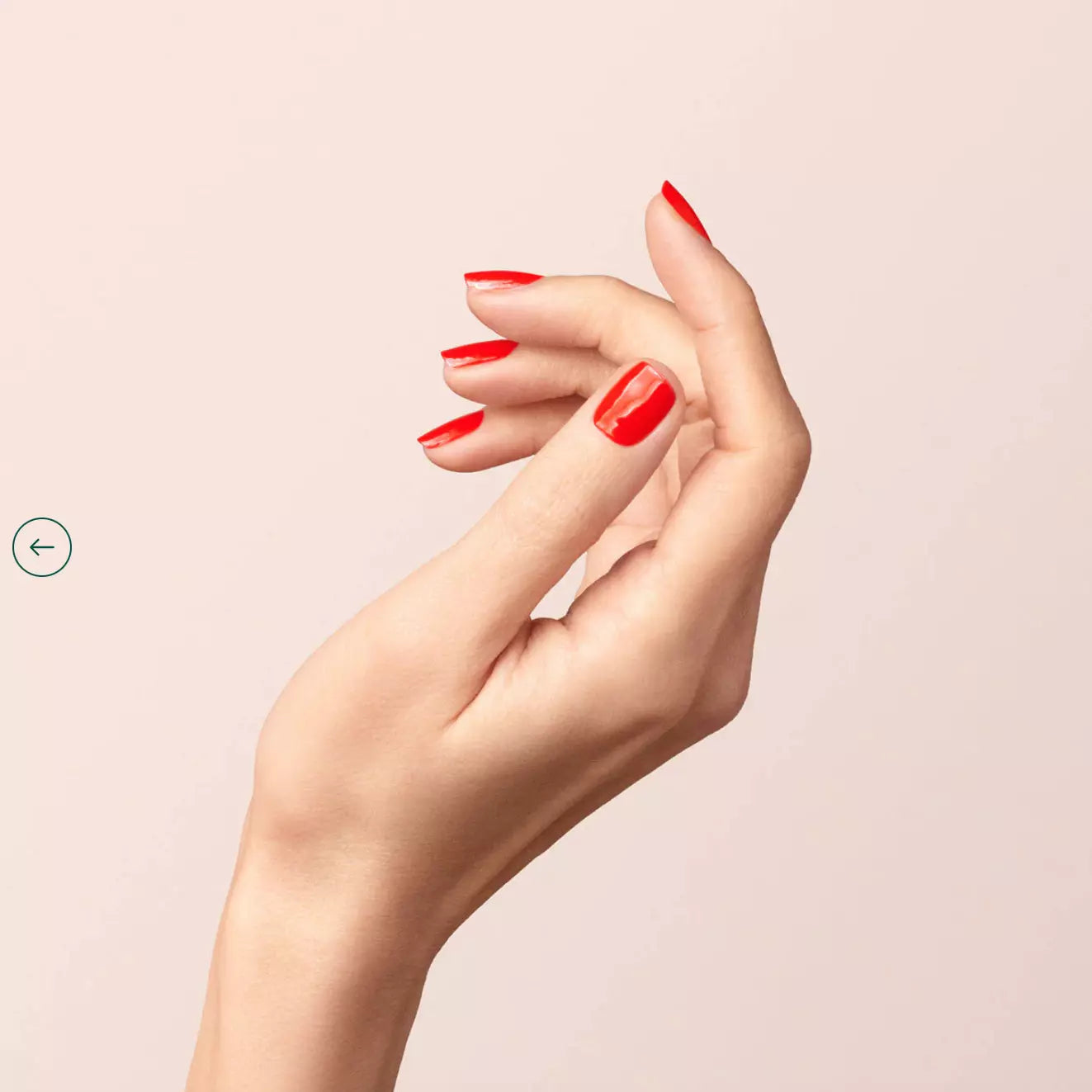 Manucurist Paris Green Range Red Coral – eco-friendly coral polish applied for a radiant manicure
