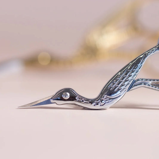 Bio Sculpture Silver Stork Scissors – cruelty-free, ergonomic curved blade scissors with a stylish stork motif for accurate, salon-quality nail care