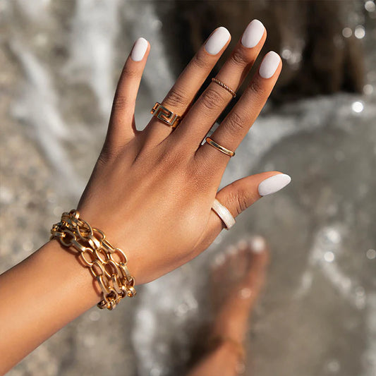 Bio Sculpture Gemini Nail Polish No. 296 Seafoam 14ml. Hand with dark skin tone – gentle, vegan pastel seafoam polish for inclusive, radiant manicures