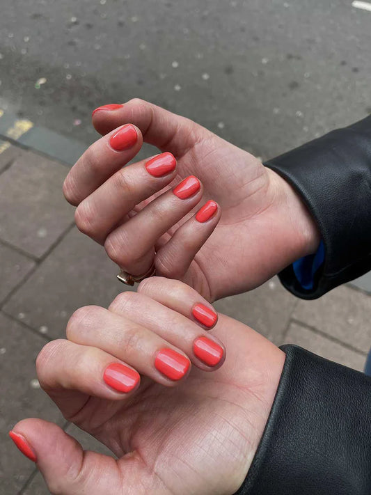 Close-up of Bio Sculpture Gemini Nail Polish No. 119 Sugar Sweet Pea polish on light skin – non-toxic, soft pink shade for a refined, everyday nail loo