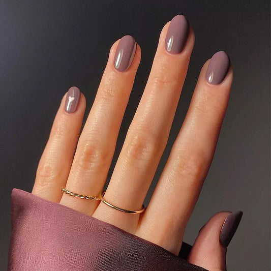 Close-up of Bio Sculpture Gemini Nail Polish No. 181 The Artist’s Muse polish on light skin – non-toxic, earthy rose shade for a refined, everyday nail look