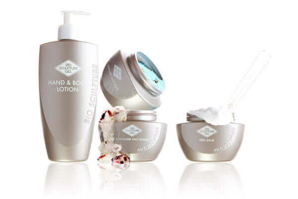 Bio Sculpture spa range featuring hand and body lotion, salt scrub, and heel balm for luxurious manicures.