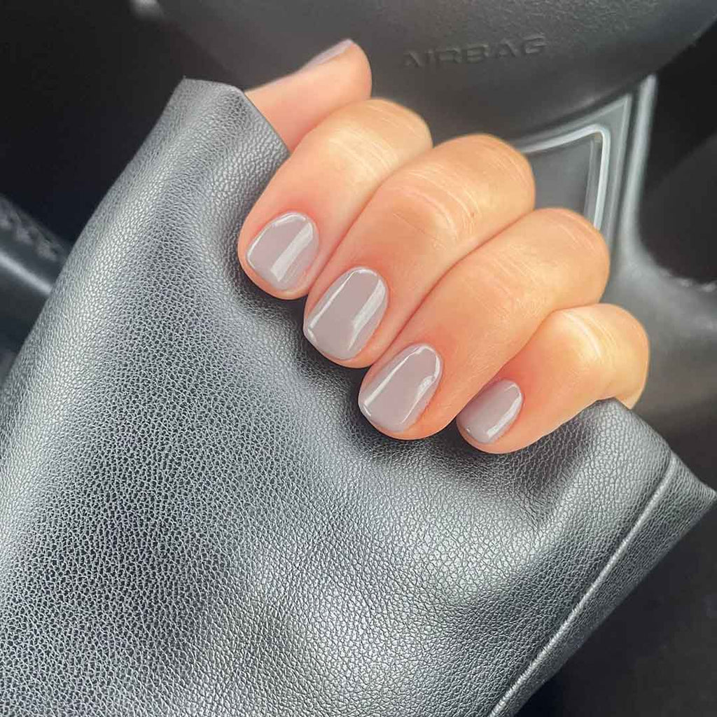 Nails featuring Bio Sculpture Gemini Nail Polish No. 115 Eclipse on light skin – cruelty-free, classic black polish with a glossy finish for an elegant effect