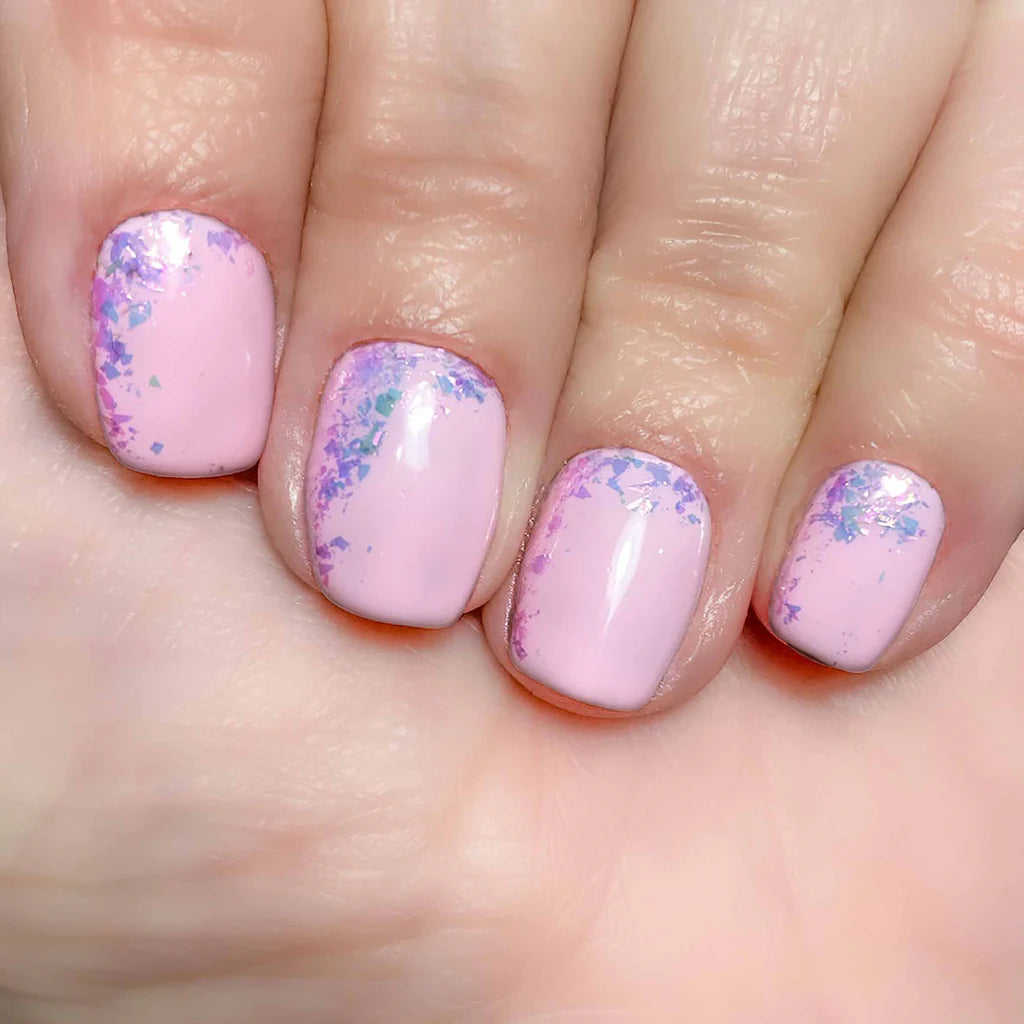 Close-up of Candy Pink Glitter on light skin – ultra-fine pink glitter for a chic, radiant nail look