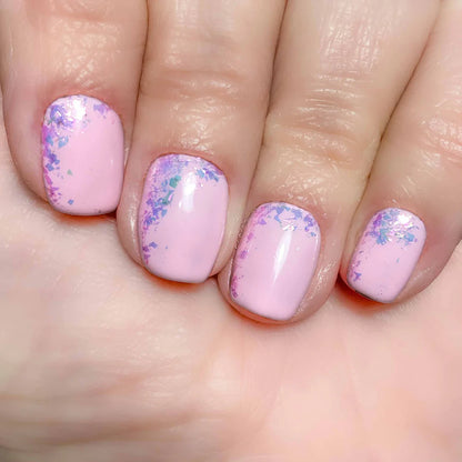 Close-up of Candy Pink Glitter on light skin – ultra-fine pink glitter for a chic, radiant nail look