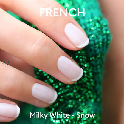 Hand with light skin tone wearing Manucurist Milky White – gentle, vegan white polish for a fresh, natural manicure