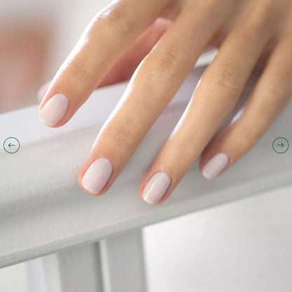 Close-up of Milky White polish on light skin – eco-friendly, milky white shade for clean, understated nails