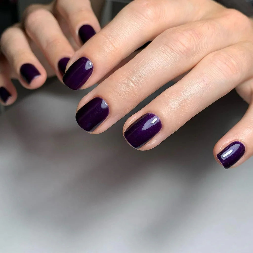 Fingers painted with Bio Sculpture Gemini Nail Polish Shade Amethyst Moonstone No.139  on light skin. Non-toxic, eco-friendly, breathable, cruelty-free, amethyst polish with subtle shimmer for a chic, versatile look