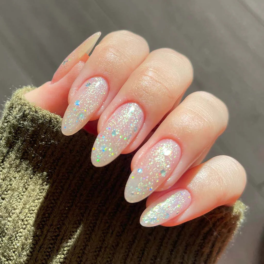 Fingers painted with Bio Sculpture Gemini Nail Polish No. 247 Mermaids Tale on light skin – breathable, shimmering teal polish for a polished, mermaid-inspired style
