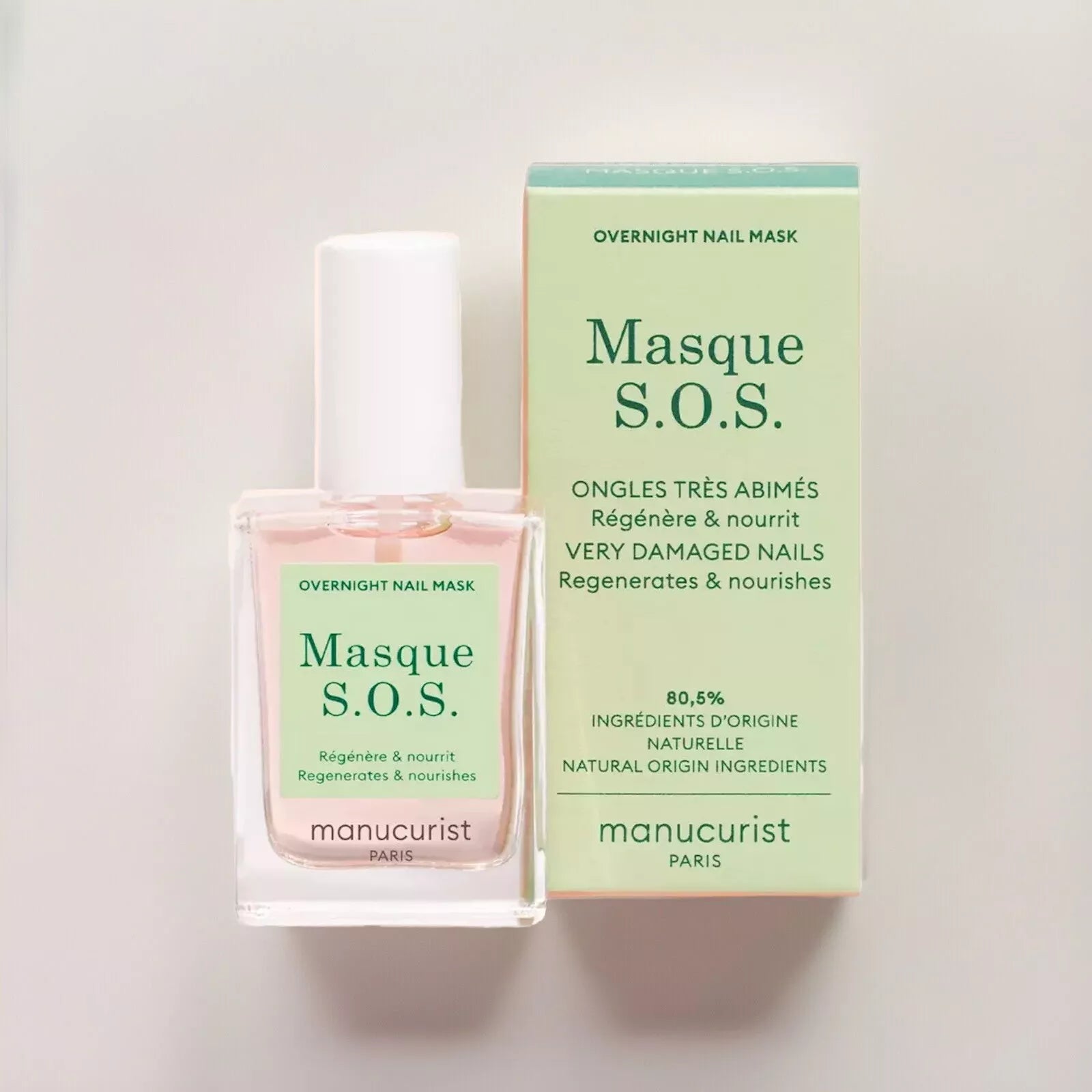 Close-up of Manucurist S.O.S. Nail Mask bottle – nourishing, plant-based base coat for healthy, revitalised nails
